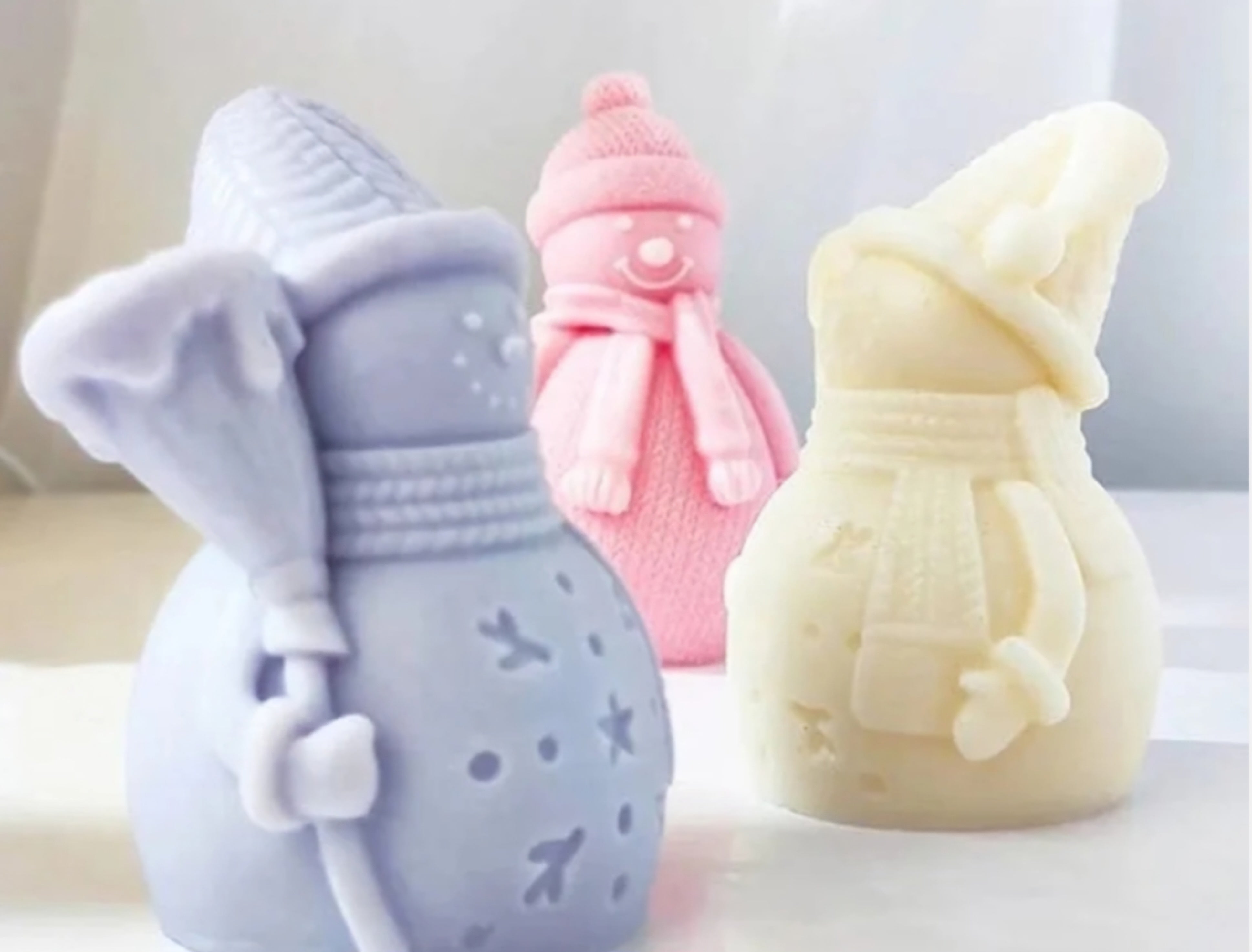 Snowman with stick candle