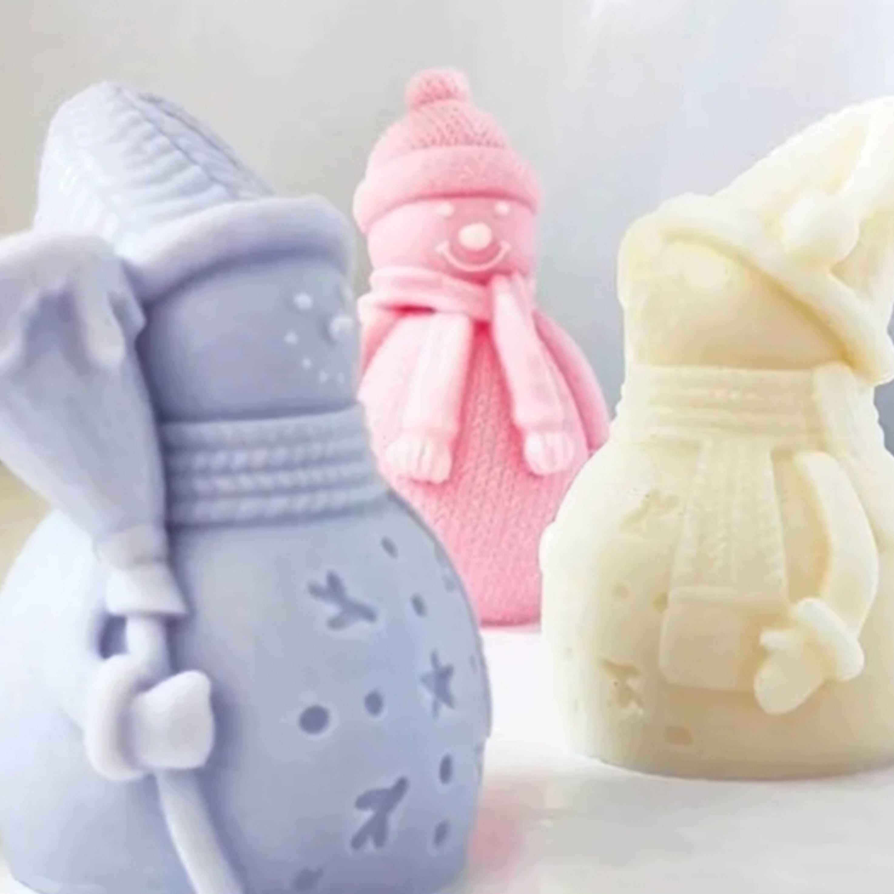 Snowman with stick candle