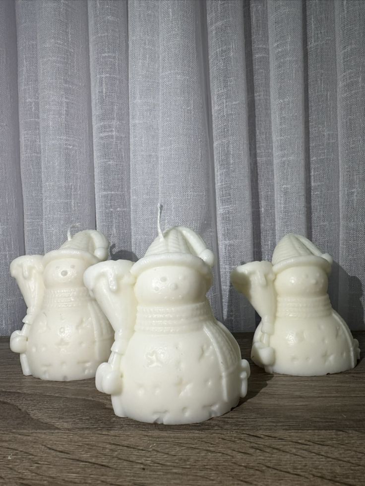 Snowman with stick candle